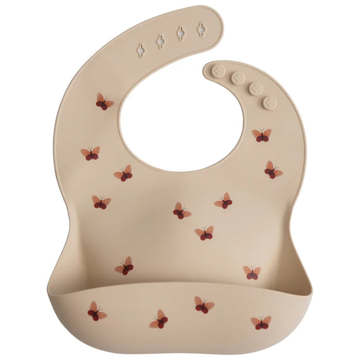 
    Babador De Silicone Infantil Mushie Butterflies - Mushie Babytunes
  