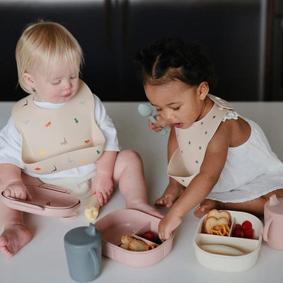 Babador De Silicone Infantil Mushie Dinosaurs - Design Ajustavel