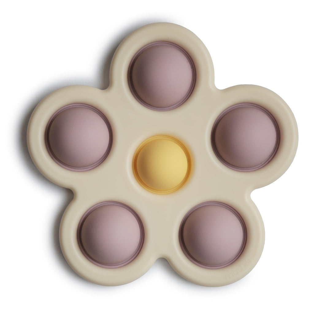 Brinquedo Para Prensar Mushie Flores Soft Lilac/ Daffodil/ Ivory