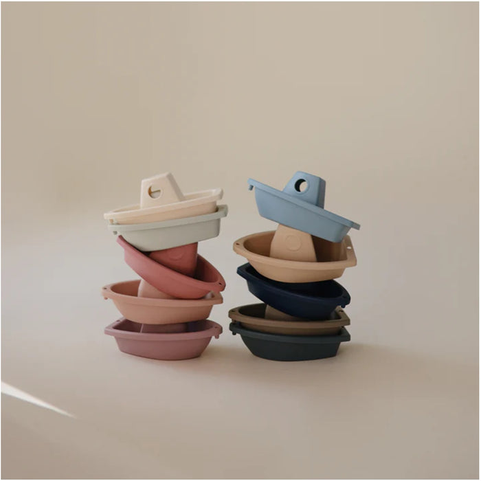 
    Brinquedo De Banho Barcos Mushie Petal - Mushie Babytunes
  