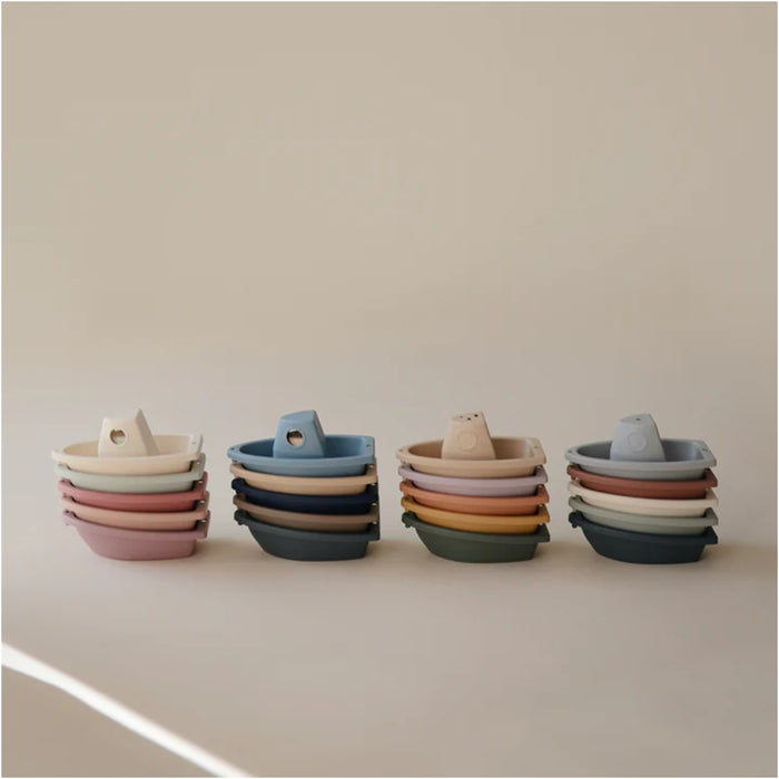 
    Brinquedo De Banho Barcos Mushie Petal - Mushie Babytunes
  