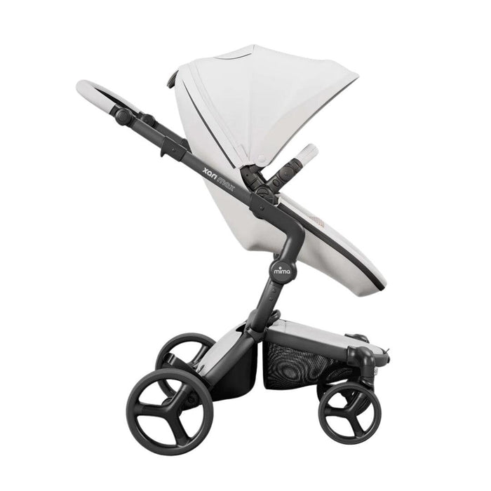 
    Carrinho de Bebê Mima Xari Max Branco Com Estrutura Preta e Assento de Bolinhas - Mima Babytunes
  