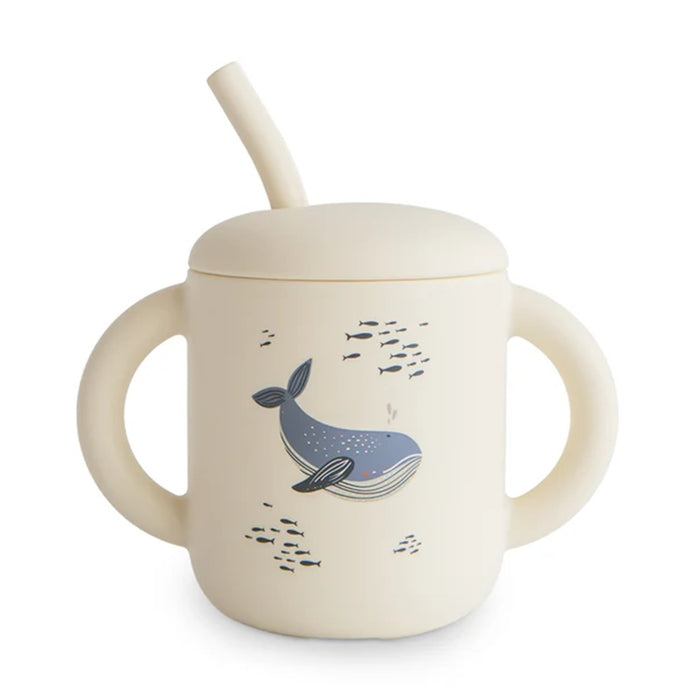 
    Copo Infantil Mushie Com Alças e Canudo Whales - Mushie Babytunes
  