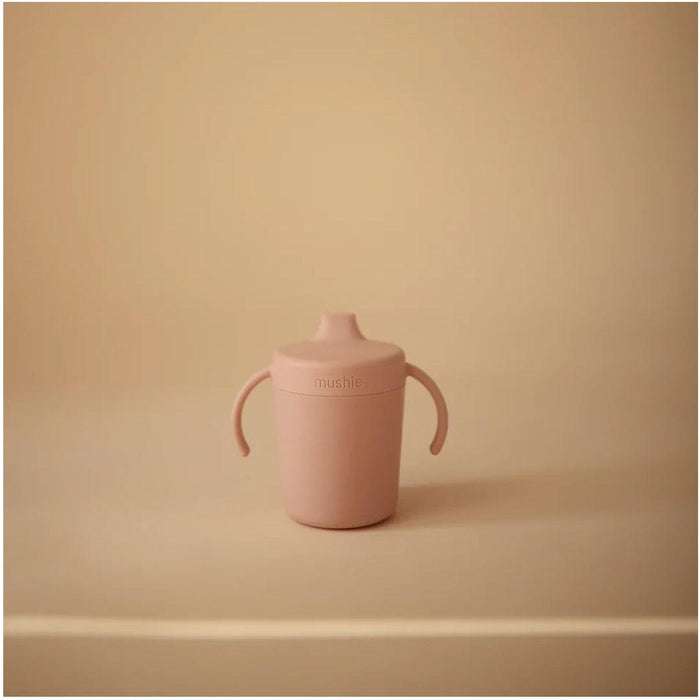 
    Copo de Treinamento Infantil Mushie Sippy Blush - Mushie Babytunes
  