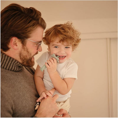 Escova De Dentes Infantil Com Ventosa Mushie Shifting Sand - Material Seguro