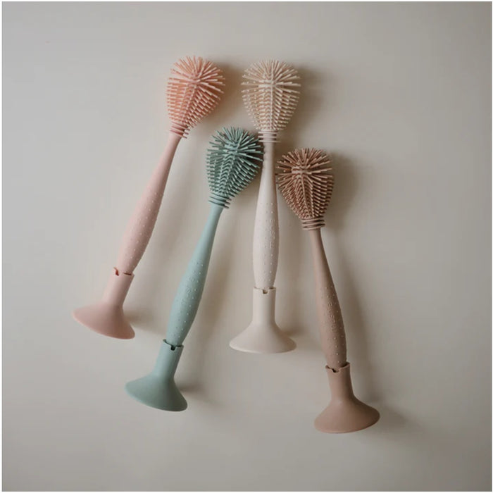 
    Escova Para Mamadeira de Silicone Mushie Shifting Sand - Mushie Babytunes
  
