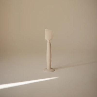 Espátula Para Aplicar Creme em Fralda Mushie Shifting Sand - Base com ventosa inteligente