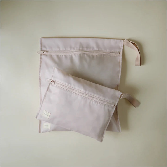 
    Kit Bolsa Impermeável Para Roupas Mushie Blush - Mushie Babytunes
  