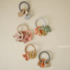 Mordedor Infantil Mushie Fairy Teething Ring