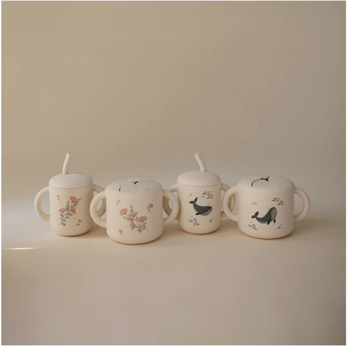 
    Porta Snack Infantil Mushie Whales - Mushie Babytunes
  