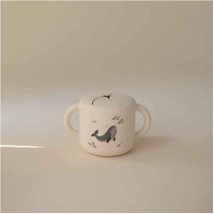 
    Porta Snack Infantil Mushie Whales - Mushie Babytunes
  