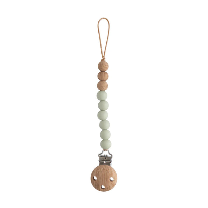 
    Prendedor De Chupeta Infantil Mushie EVA Sage - Mushie Babytunes
  
