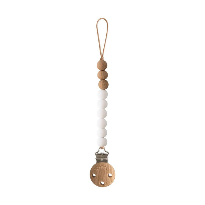 
    Prendedor De Chupeta Infantil Mushie EVA White - Mushie Babytunes
  