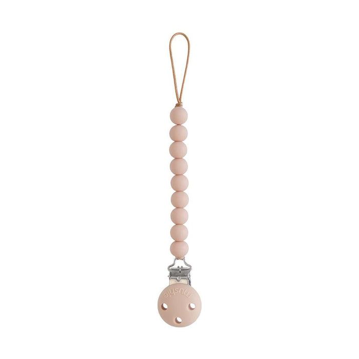 
    Prendedor De Chupeta Infantil Mushie Hera Blush - Mushie Babytunes
  