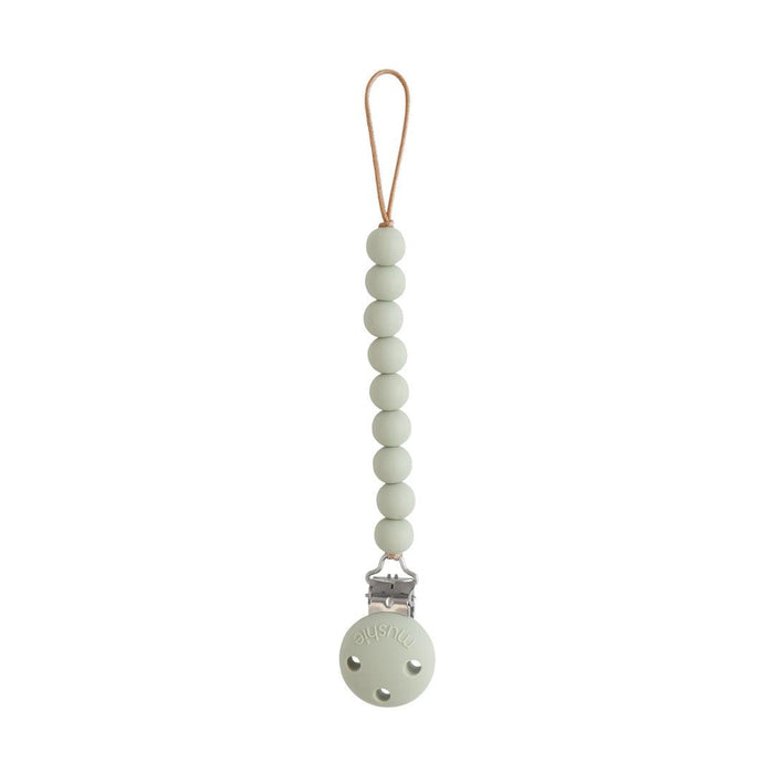 
    Prendedor De Chupeta Infantil Mushie Hera Sage - Mushie Babytunes
  
