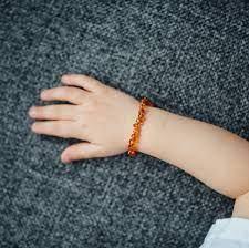 
    Pulseira de Âmbar Amber Crown Cor Mel - Amber Crown Babytunes
  