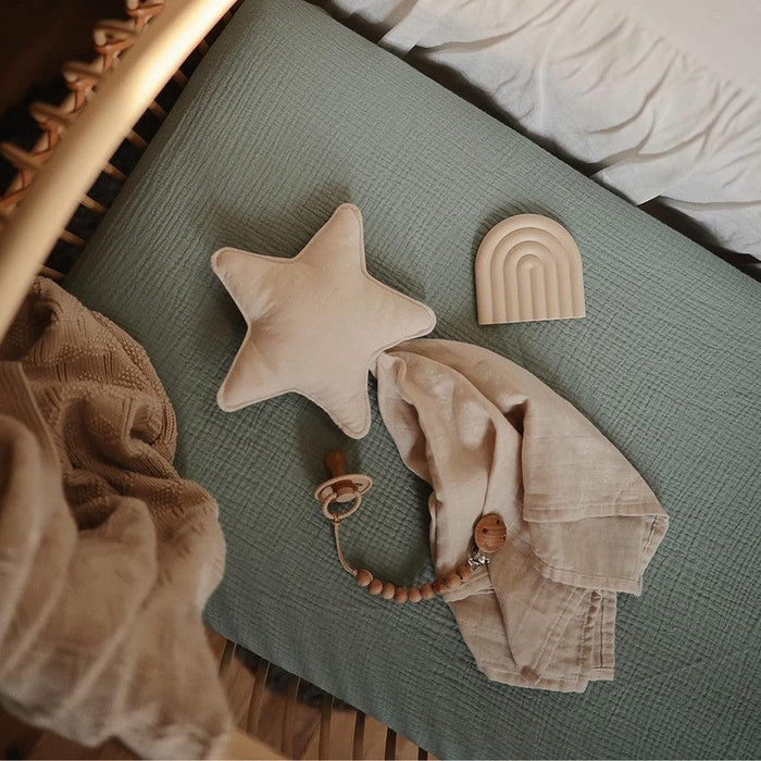 
    Mordedor de Arco-Íris Mushie Shifting Sand - Mushie Babytunes
  