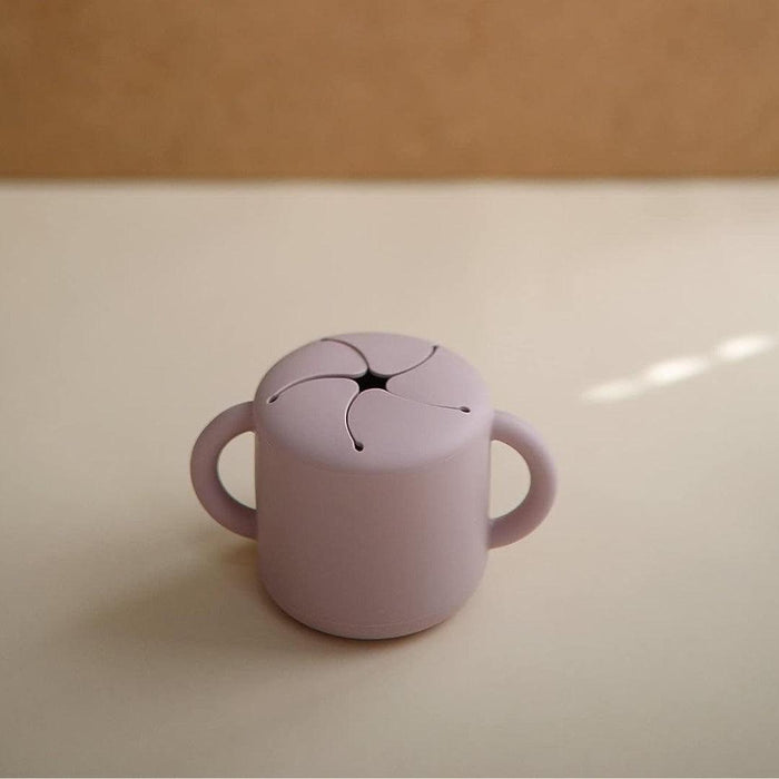 
    Porta Snack Infantil Mushie Soft Lilac - Mushie Babytunes
  