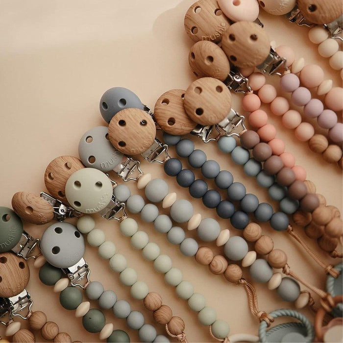 
    Prendedor De Chupeta Infantil Mushie EVA Stone - Mushie Babytunes
  
