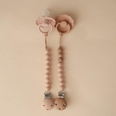 Prendedor De Chupeta Infantil Mushie EVA Blush - Instruções de Limpeza