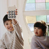 Brinquedo Telefone Press Toy Mushie Tradewinds - Mushie Babytunes