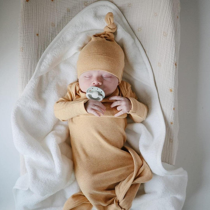 
    Toalha Infantil Com Capuz de Algodão Orgânico Mushie Pearl - Mushie Babytunes
  