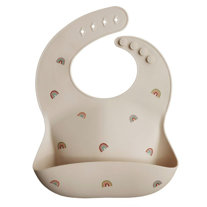 
    Babador De Silicone Infantil Mushie Rainbows - Mushie Babytunes
  