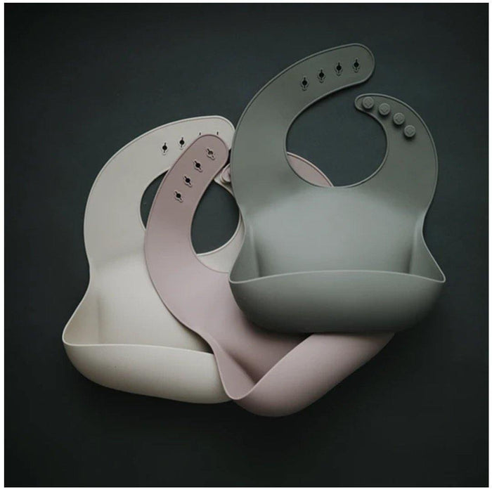
    Babador De Silicone Infantil Mushie Blush - BR - Mushie Babytunes
  