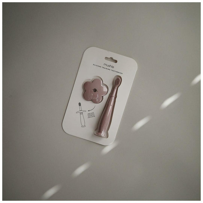 
    Escova De Dentes Infantil Com Ventosa Mushie Soft Lilac - Mushie Babytunes
  