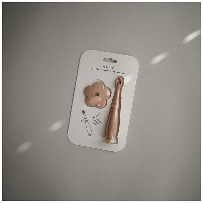
    Escova De Dentes Infantil Com Ventosa Mushie Blush - Mushie Babytunes
  