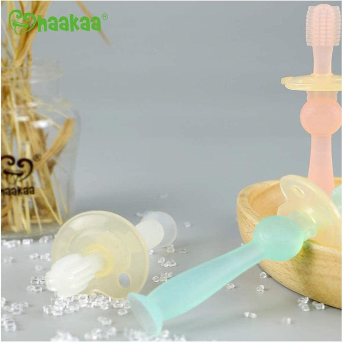 
    Escova Dental Infantil de Silicone 360° Haakaa Clear - Haakaa Babytunes
  