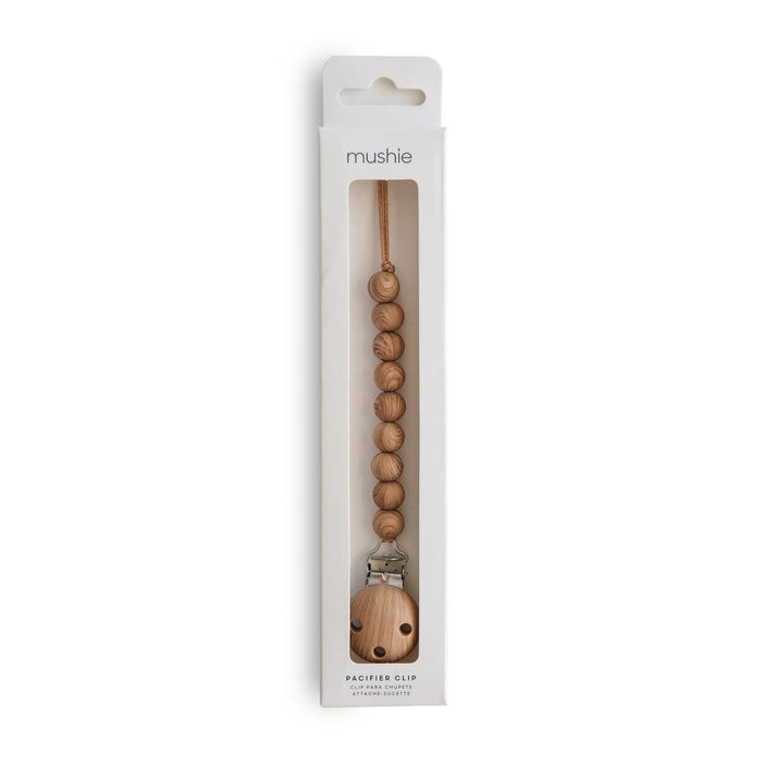 
    Prendedor De Chupeta Infantil Mushie Hera Faux Wood - Mushie Babytunes
  