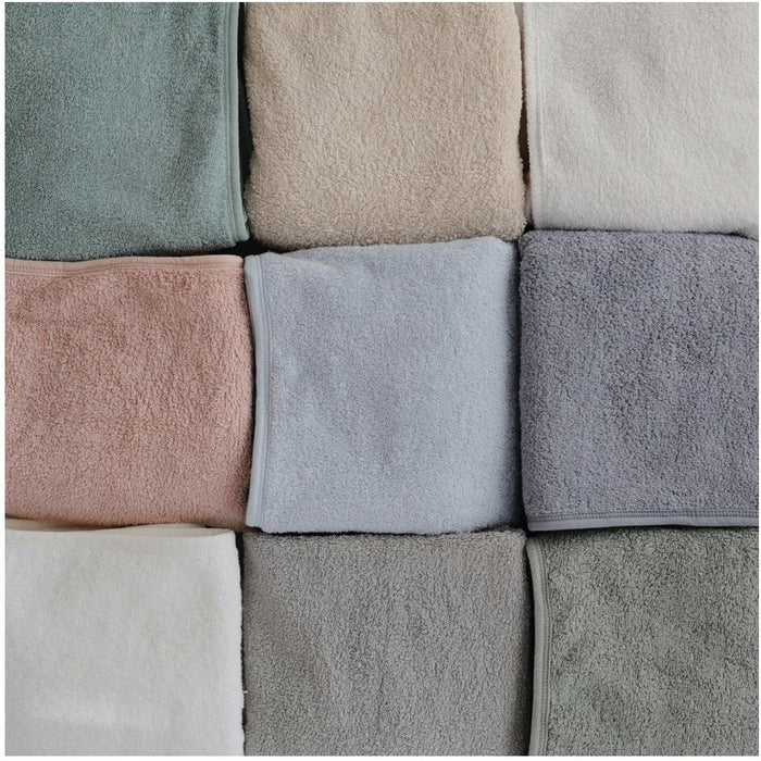
    Toalha Infantil Com Capuz de Algodão Orgânico Mushie Tradewinds - Mushie Babytunes
  